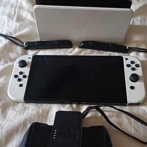 Nintendo Switch OLED Console with White Joy-Con and Black Accents